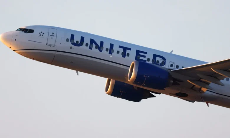 Man arrested and accused of sneaking onto United Airlines flight with fake boarding pass