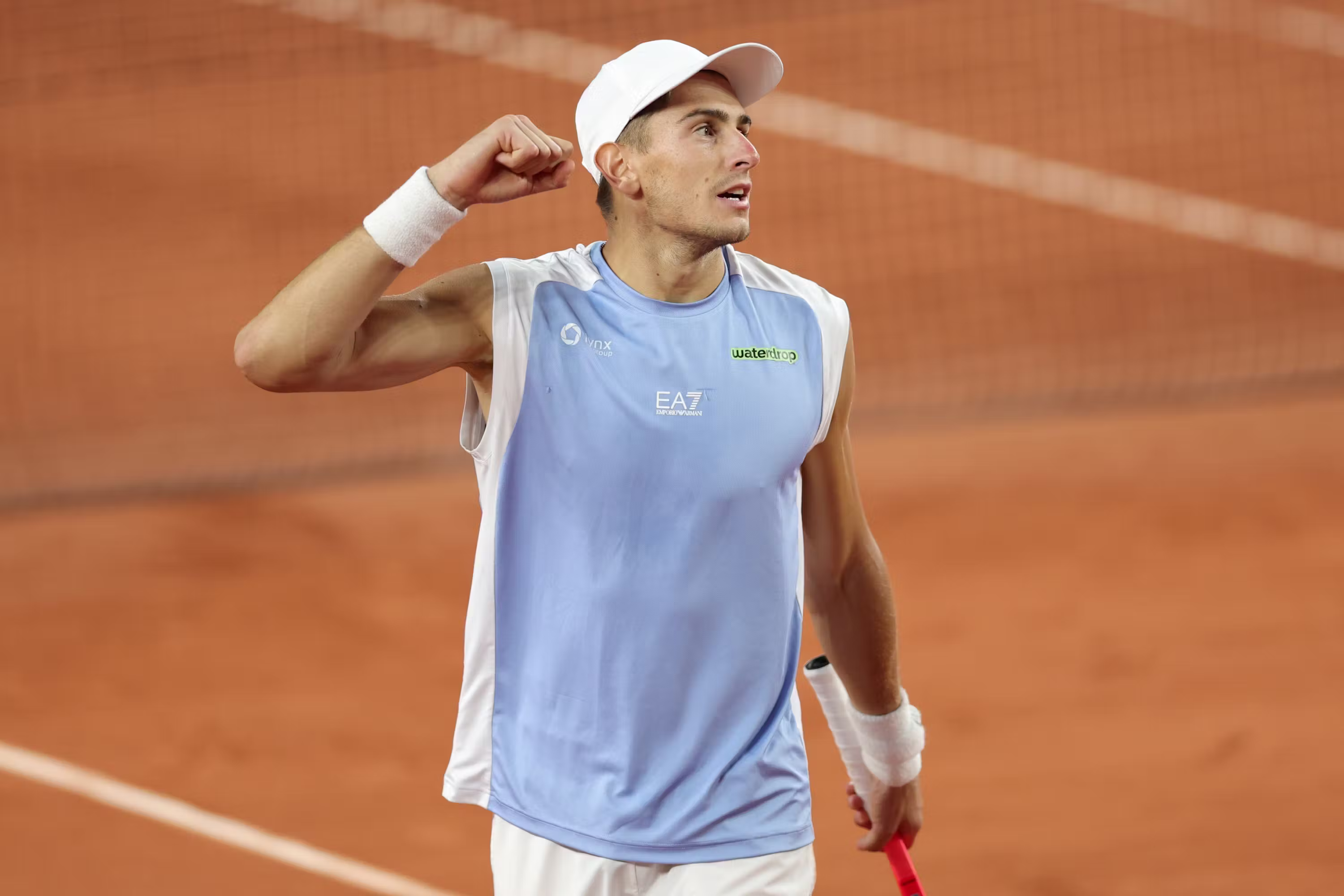 Marathon man Arnaldi claims Tiafoe thriller
