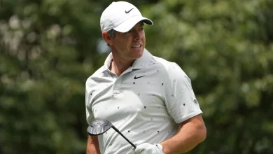 Memorial Tournament: Rory McIlroy and Scottie Scheffler sneak under par before play suspended due to storm