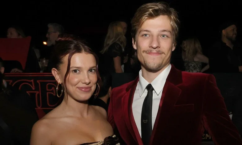 Millie Bobby Brown defends husband Jake Bongiovi after critics blast him for not helping with their bags