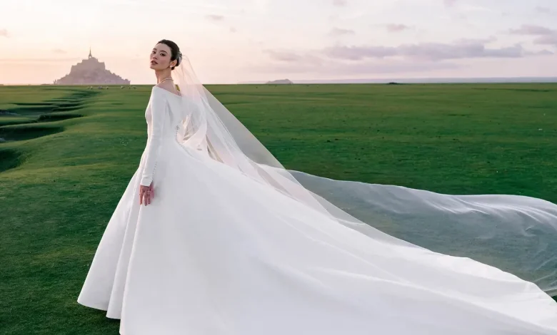 Model Ming Xi Wore a Custom Dior Haute Couture Dress to Marry at Mont Saint-Michel in Northern France