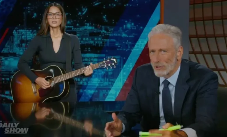 Olivia Munn Returns to ‘The Daily Show,’ Gives Jon Stewart the Farewell She Saved for Stephen Colbert: ‘I Missed Out’ | Video