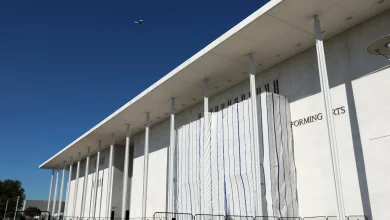PHOTOS: What’s under the tarp? Kennedy Center facade covered after Trump’s name removed