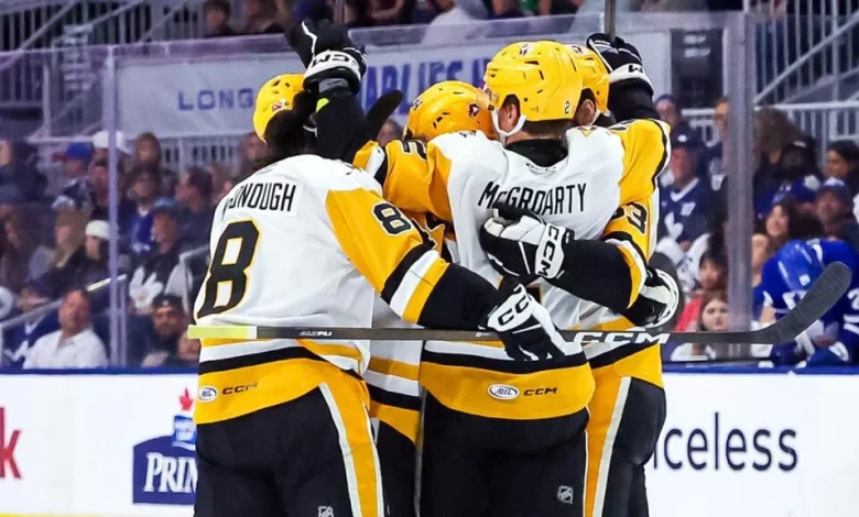 Penguins capitalize late, even series with Marlies