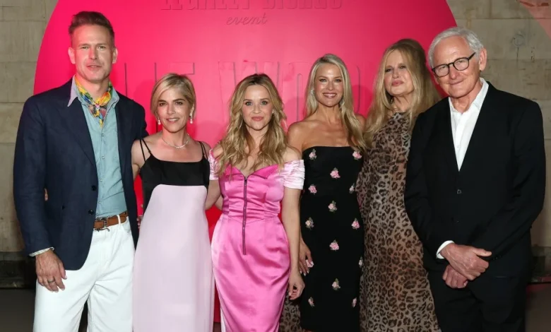 Reese Witherspoon Passes "Pink Torch" To 'Elle' Star Lexi Minetree