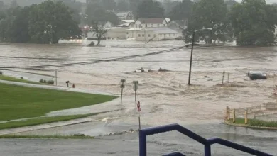 Residents evacuate to rooftops amid extreme flash flooding in Lanesville, Indiana