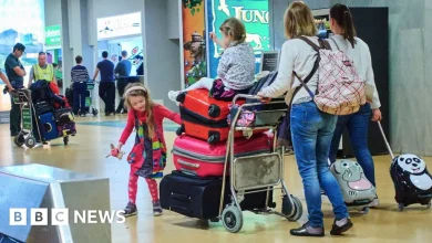 Ryanair says it will reluctantly not charge parents to sit next to children