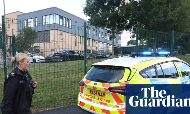 Schoolgirl arrested after three stabbed at Manchester school