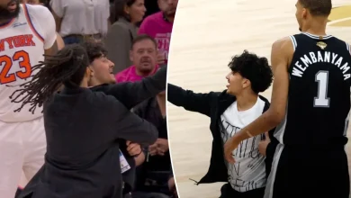 Selfie-taking fan storms court in surreal NBA Finals Game 1 scene