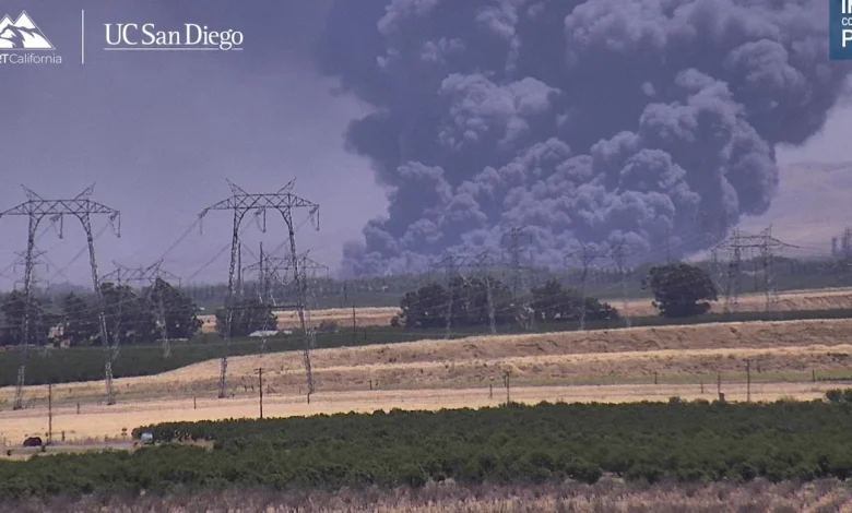 Tracy warehouse fire produces large black plume of smoke, nearby evacuations