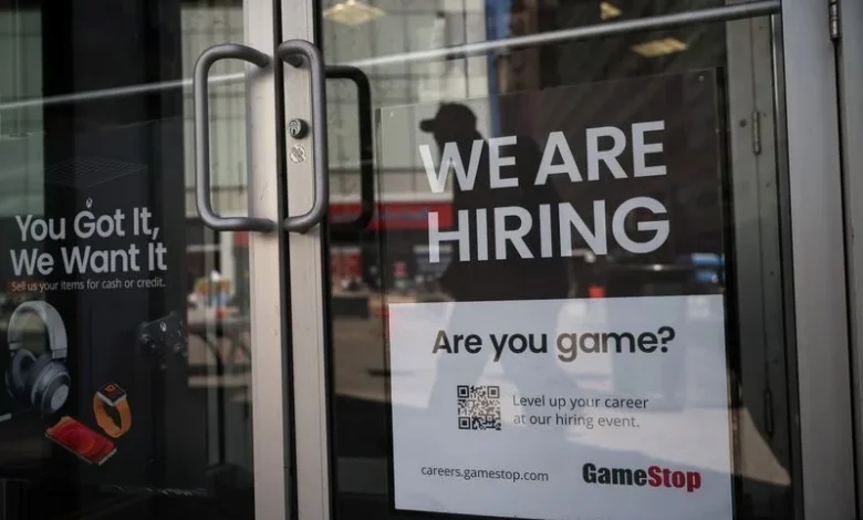 US weekly jobless claims fall, but remain elevated