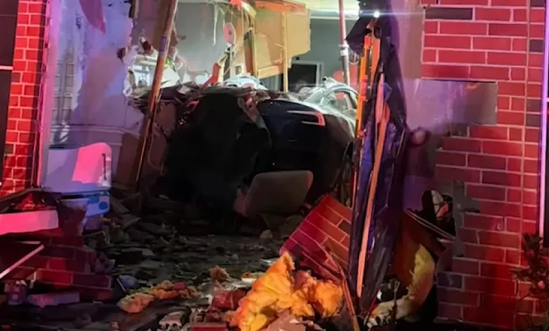 Woman killed, driver injured after Tesla crashes through Katy-area home, Harris County Sheriff's Office says